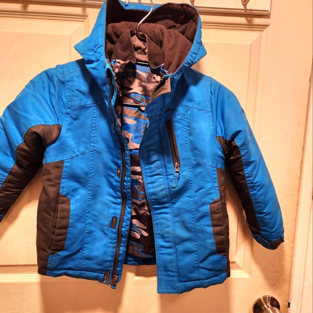 Blue and Black Kids Jacket With Zip Up Insert.